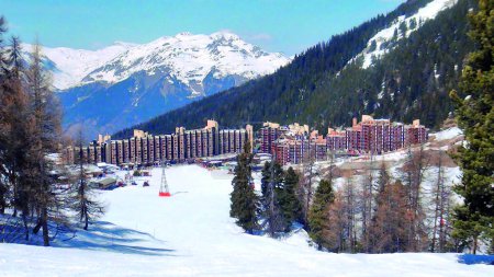View of the center and the snow front of the famous ski resort of La Plagne-Bellecote in the heart of the French Alps in the Tarentaise valley at the foot of Mont Blanc