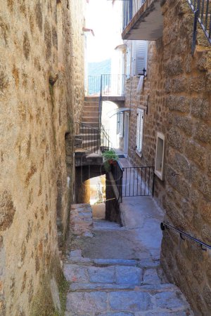 One of the charms of Sartene, a town in Corsica (nicknamed the Island of Beauty), in the heart of the Mediterranean Sea, is its narrow streets: stone houses with laundry drying in the windows and cobbled staircases
