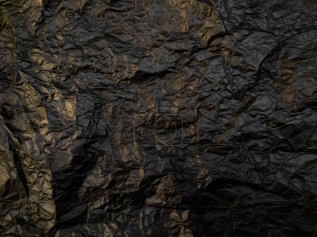 Foto de Papel negro arrugado con textura. Fondo negro oscuro texturizado. - Imagen libre de derechos