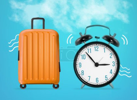Foto de Viaje maleta de viaje naranja con un reloj sobre fondo azul, tiempo para viajar concepto - Imagen libre de derechos