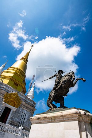 Photo for Pra Maha Chedi Chanasuk Pagoda with The Monument of King Naresuan, Chiang Rai Province. - Royalty Free Image