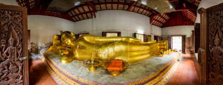 Photo for Reclining Buddha in Phra Sing Waramahavihan temple, Chiang Mai province. - Royalty Free Image