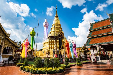 Photo for Phra That Hariphunchai pagoda with beautiful lantern in Lamphun Lantern Festival, Lamphun province. - Royalty Free Image