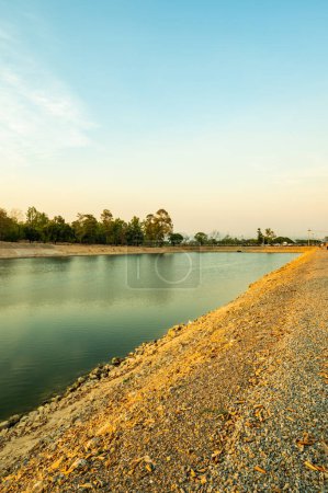 Photo for Reservoir with walkway at sunset, Chiang Mai province. - Royalty Free Image