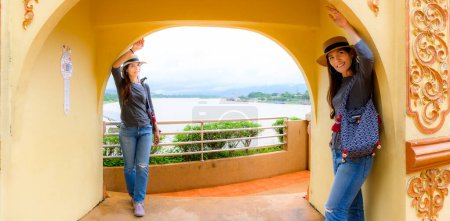 Photo for Pamorama of Twin Women Traveler with Golden Triangle View, Chiang Rai Province. - Royalty Free Image