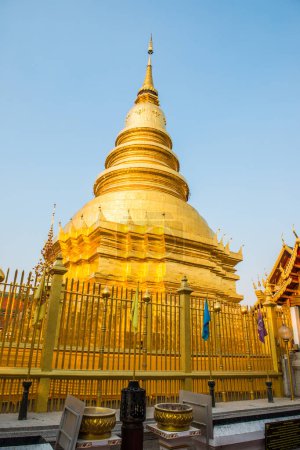 Photo for Beautiful Lanna pagoda at Phrathat Hariphunchai temple, Thailand. - Royalty Free Image