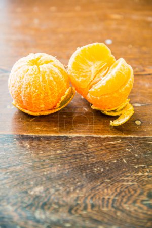 Photo for Mandarin oranges on wooden table, Thailand. - Royalty Free Image