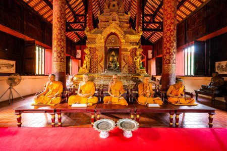 Photo for CHIANG MAI, THAILAND - May 11, 2020 : Buddhist monks wax model in Phra Sing Waramahavihan temple, Chiang Mai province. - Royalty Free Image