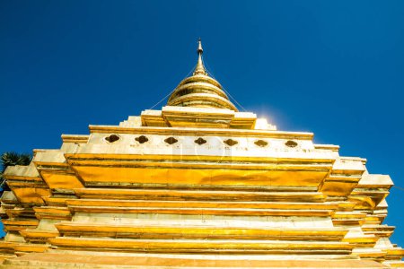 Photo for Golden Pagoda at Wat Phra That Si Chom Thong Worawihan, Thailand. - Royalty Free Image