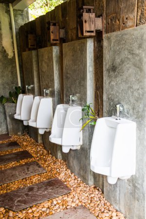 Photo for Row of Urinals in park, Thailand - Royalty Free Image