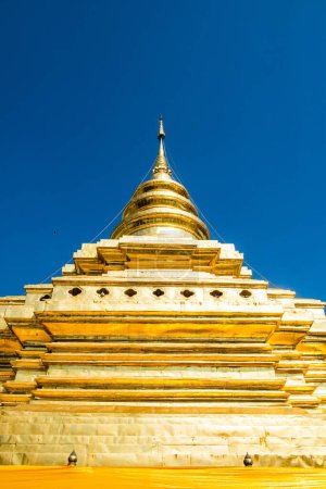 Photo for Golden Pagoda at Wat Phra That Si Chom Thong Worawihan, Thailand. - Royalty Free Image