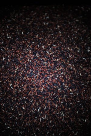 Background of black rice or riceberry. This product has high nutritional value and delicious taste.
