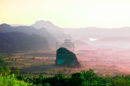 Beautiful mountain view and morning mist of Phu Langka National Park during sunrise in Phayao Province, Thailand.