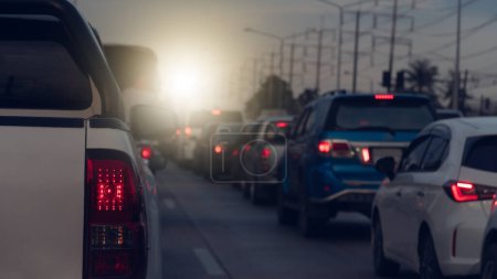 Photo for Rear side of pickup car white color with turn on brake light on asphalt roads. During rush hours for travel or business work. Environment of traffic jam with many cars. - Royalty Free Image