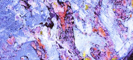 Fondo de textura abstracta. Es de color azul con salpicaduras negras, blancas, púrpuras y rosadas. Los colores se mezclan para formar sus tonos. Diferentes puntos y formas.