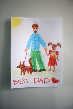 Photo for Photo postcard to the Dad drawn by child. White background. Drawing with colored pencils. Dad is depicted with girl and a dog. The girl is eating ice cream. Inscription to the Best Dad. Father's Day. - Royalty Free Image