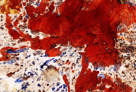Photo for Abstract background. A large dirty red spot is clustered in the upper right part of the background. The white background is filled with small spots of various shades of brown, blue, and orange colors. - Royalty Free Image