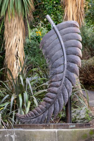 Photo for Queenstown South Island, New Zealand - 13 May 2023. Bronze sculpture of Silver Fern leaf near the north entrance to the Queenstown Gardens. Icon by Paul Dibble. - Royalty Free Image