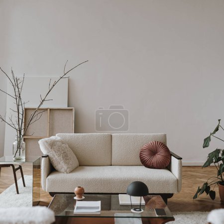 Photo for Elegant Scandinavian hygge style home living room interior: comfortable sofa, pillow, white walls, home plants. Aesthetic luxury bright apartment interior design concept - Royalty Free Image