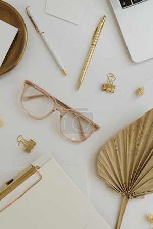Photo for Aesthetic workspace with laptop, glasses, female accessories on white background. Flat lay, top view women business concept - Royalty Free Image