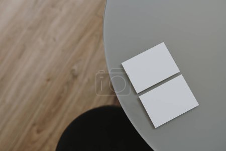 Photo for Blank paper sheet cards with mockup copy space on grey table. Aesthetic bohemian minimal business brand template. Flat lay, top view - Royalty Free Image