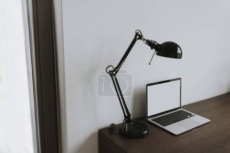 Photo for Modern minimal interior design concept. Bright Scandinavian home office desk table workspace with laptop computer, lamp, chair - Royalty Free Image