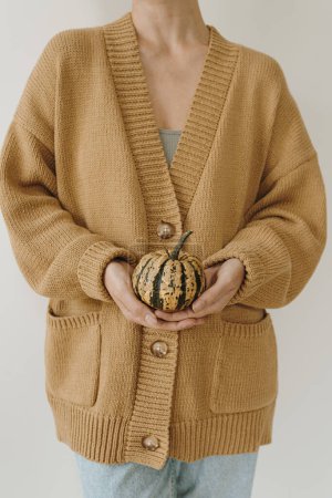 Photo for Woman holding pumpkin. Autumn, fall, thanksgiving, halloween concept - Royalty Free Image