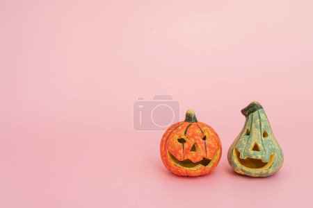 Photo for Halloween pumpkins on pink background - Royalty Free Image