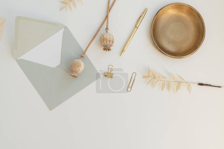 Photo for Aesthetic wedding invitation card in envelope. Flat lay, top view holiday event celebration. Blank mockup copy space - Royalty Free Image