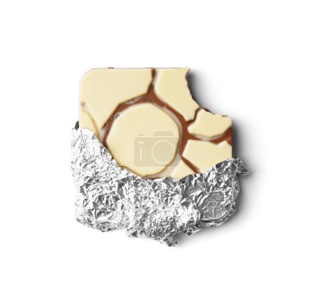 Photo for Bitten chocolate in a silver shiny foil on a white background top view. Broken chocolate bar on isolation. Chocolate with a bitten corner. - Royalty Free Image