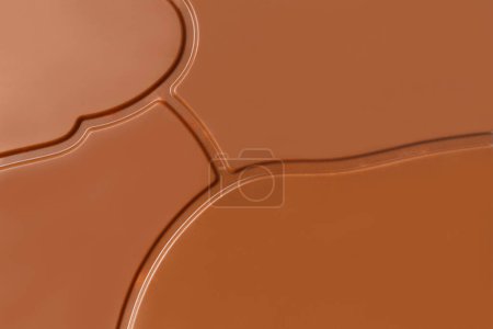 Foto de Fondo de chocolate, textura de chocolate con leche con un hermoso patrón de primer plano. - Imagen libre de derechos
