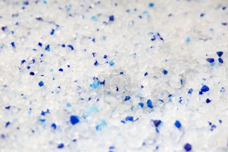 Photo for Silica gel white with blue crystals cat litter close-up. Abstract background of pure silica gel crystals. - Royalty Free Image