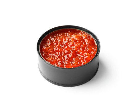 Foto de Caviar de salmón rojo en una lata negra abierta sobre un fondo blanco. Delicias útiles mariscos, conservas de pescado. - Imagen libre de derechos