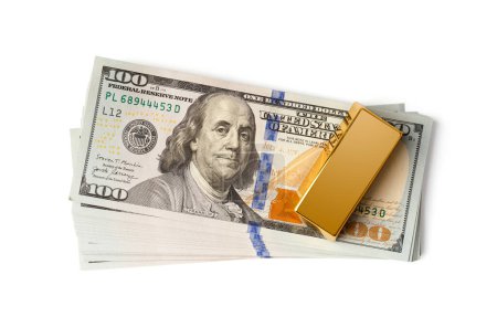Foto de Barras de oro, billetes de 100 dólares en una vista superior de fondo blanco, el concepto de finanzas, negocios, riqueza, éxito. - Imagen libre de derechos