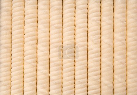 Photo for Crispy wafer rolls close-up as a background with space for text. Background of beautifully laid out sweet crispy wafers copy space. - Royalty Free Image