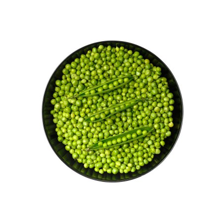 Photo for Peeled grains of fresh green peas in a round black plate and green pea pods on a white background, top view. Vegetable protein, healthy products. - Royalty Free Image