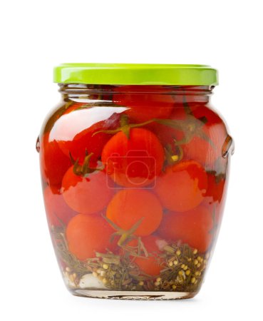 Photo for Canned cherry tomatoes in a closed glass jar isolated on a white background, close-up. Pickled tomatoes with spices - Royalty Free Image