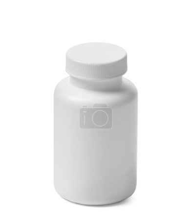 Foto de Botella de plástico blanco para vitaminas, medicamentos, complementos alimenticios sobre un fondo blanco. Contenedor médico para pastillas. - Imagen libre de derechos
