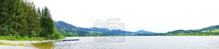 Photo for Gruentensee in the Allgau in Bavaria. View of the lake with the surrounding landscape near Nesselwang. - Royalty Free Image