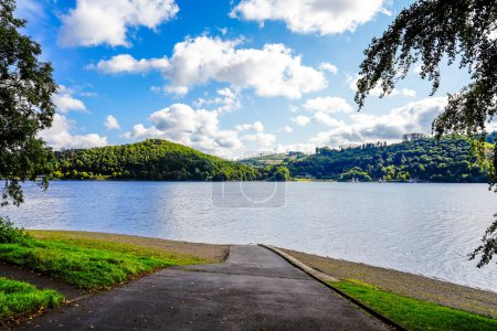 View of the Biggesee near Attendorn in the Olpe district with the surrounding nature. Landscape by the lake in the Sauerland. Bigge Dam.