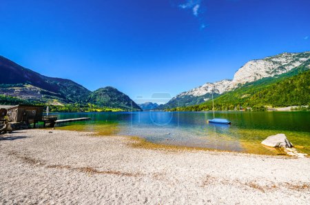 View of the Grundlsee and the surrounding landscape. Idyllic nature by the lake in Styria in Austria. Mountain lake at the Totes Gebirge in the Salzkammergut.