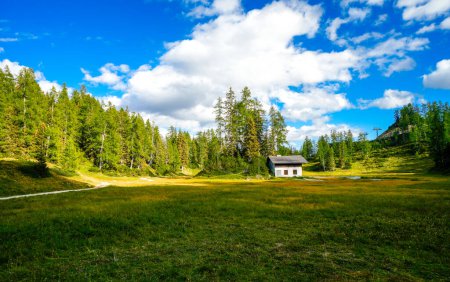 Photo for Krallersee on the high plateau of the Tauplitzalm. View of the lake at the Toten Gebirge in Styria. Idyllic landscape with green nature and a lake on the Tauplitz. - Royalty Free Image