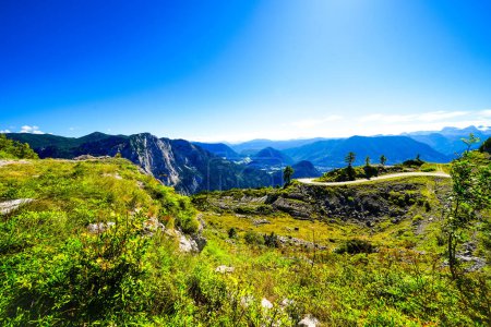 Photo for View of the surrounding landscape at the Loseralm near Altaussee in the Salzkammergut in Austria. Nature with panoramic views of the mountains on the Loser Alm in Styria. - Royalty Free Image