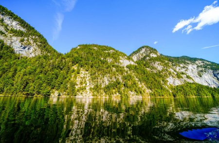 Photo for View of Lake Toplitz and the surrounding landscape. Idyllic nature by the lake in Styria in Austria. Mountain lake at the Dead Mountains in the Salzkammergut. - Royalty Free Image
