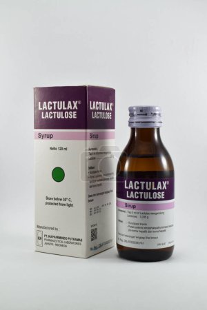 Téléchargez les photos : Pasuruan - November 15, 2022 : Lactulax lactulose syrup. Lactulax brand is a maker of lactulose products. Medicine to treat constipation or difficult bowel movements - en image libre de droit