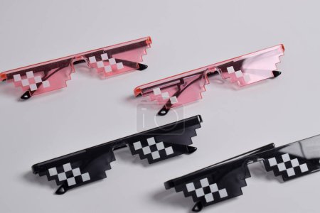 Thug life glasses black and pink color isolated on white background. Pixel art glasses