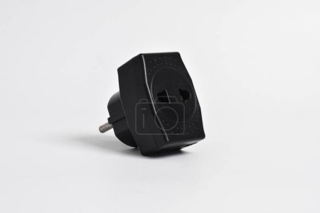 Photo for T plug, with 3 plug holes isolated on white background, electric plug socket adapter. - Royalty Free Image