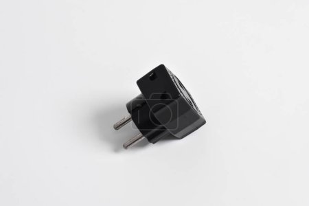 Photo for T plug, with 3 plug holes isolated on white background, electric plug socket adapter. - Royalty Free Image