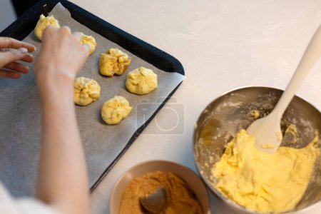 Photo for Making hotteok with sugar before baking, shape dough into a ball by hands - Royalty Free Image