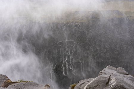 Photo for A large waterfall over a rocky cliff - Royalty Free Image